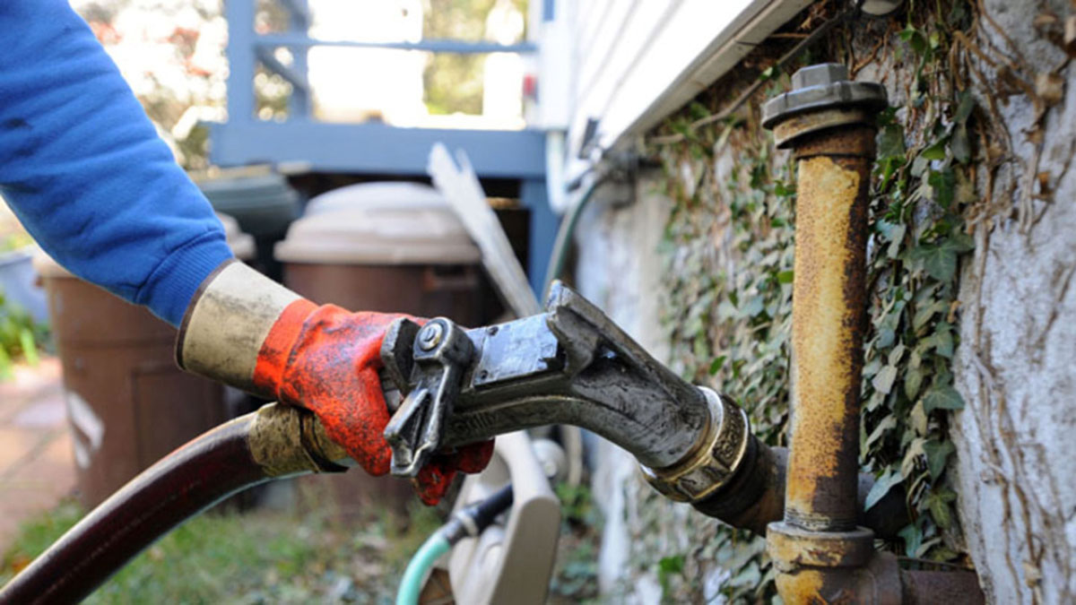 Domino Fuel heating oil delivery truck serving Huntington NY homes
